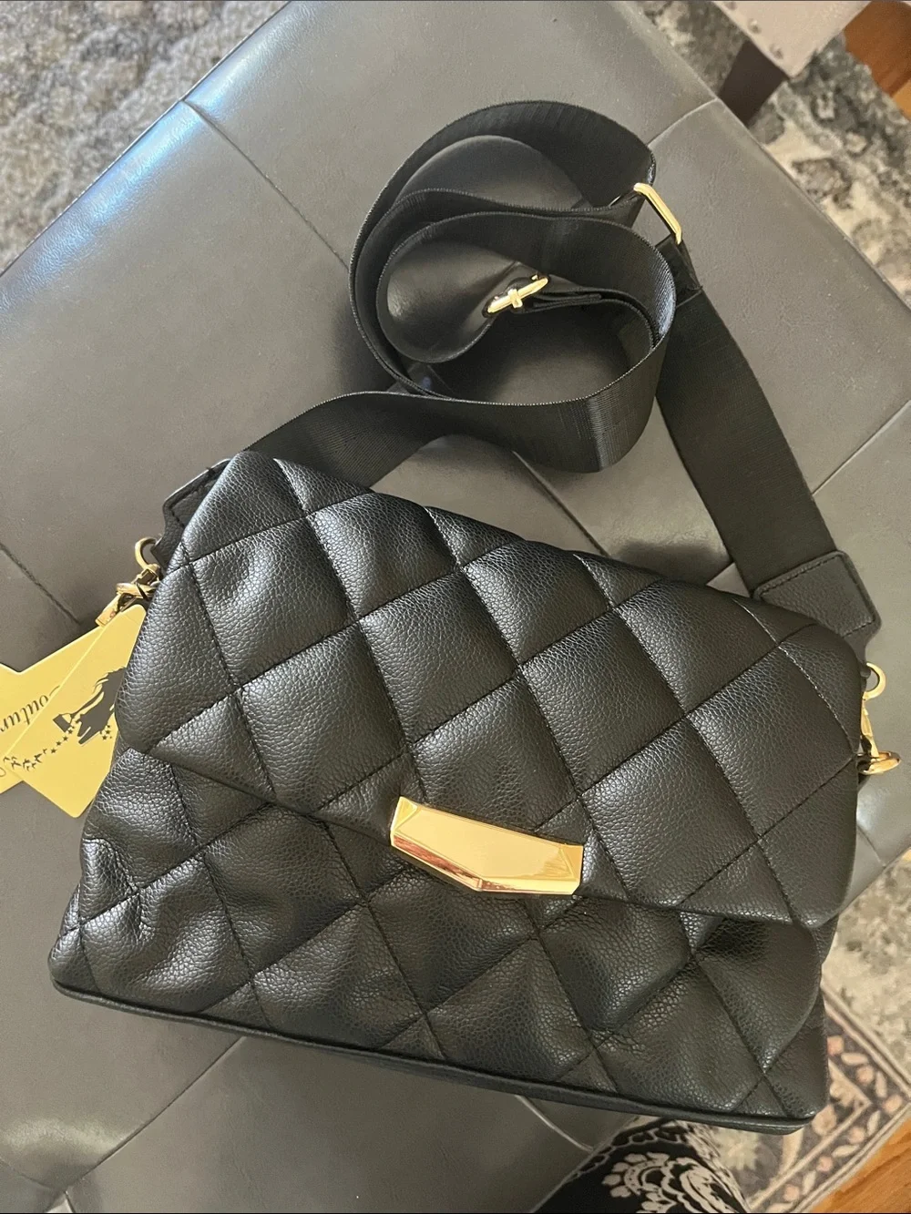 Quilted Black Leather Crossbody Bag with Gold Accent